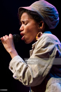 Nneka performs on stage at Circo Price Theater.
